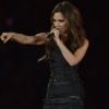 Posh Spice, Victoria Beckham, lookée et sexy pour le retour des Spice Girls sur la scène des JO le 12 août 2012