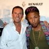 Patrick Tartary accueille Pharrell Williams au Gotha Club à Cannes, le 23 août 2012.