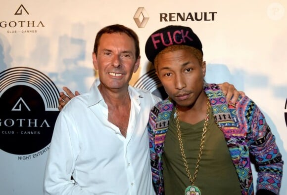 Patrick Tartary accueille Pharrell Williams au Gotha Club à Cannes, le 23 août 2012.
