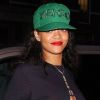 Rihanna, habillée d'un minishort et de bottines Chloë Sevigny pour Opening Ceremony et d'un pull Kenzo, une casquette de la même marque sur la tête, sort de son hôtel londonien. Le 28 août 2012.
