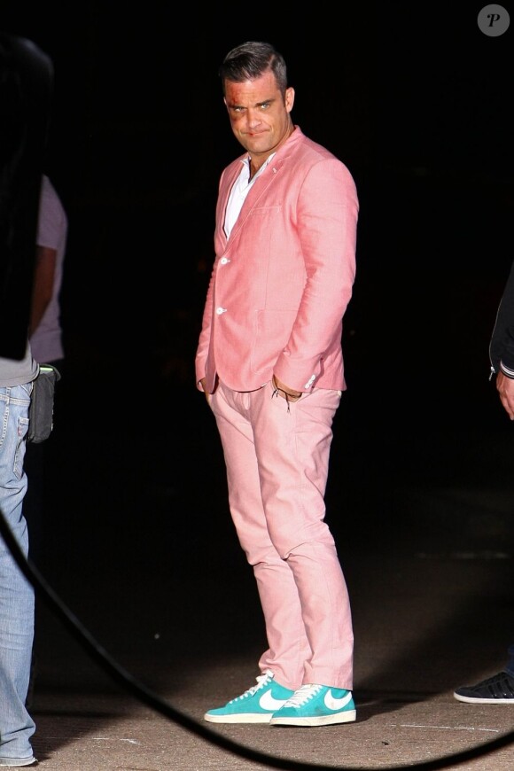 Robbie Williams sur le tournage du clip Candy à Londres, le 17 août 2012.