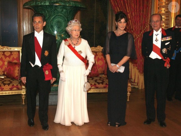 Carla Bruni et Nicolas Sarkozy en visite officielle auprès de la reine Elizabeth II et du duc d'Edimbourg à Londres, le 26 mars 2008.