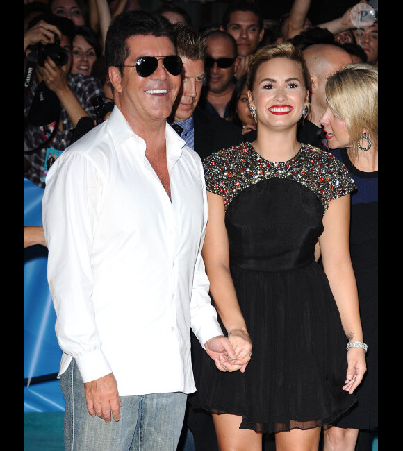 Demi Lovato et Simon Cowell lors du lancement de la deuxième saison de X Factor à Hollywood, le 11 septembre 2012
