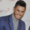 Baptiste Giabiconi très souriant à la conférence de presse du lancement de son album Oxygen, à l'hôtel Bristol à Paris, le 24 septembre 2012