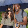 Kim Kardashian et Kanye West, sous la pluie à Miami. Le 8 octobre 2012.