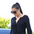 Kim et Khloe Kardashian sont allees prendre un cafe pendant le tournage de leur emission a Miami. Le 13 octobre 2012  50914896 Reality stars Kim and Khloe Kardashian out for Cuban coffee while filming their reality show in Miami, Florida on October 13, 2012.13/10/2012 - MIAMI