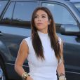 Kim Kardashian, surprise à la descente de sa Rolls-Royce noire, se rend dans une boutique Vespa suivie par les caméras de Keeping Up With The Kardashians. Miami, le 13 octobre 2012.