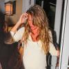 Gisèle Bündchen, enceinte, et son mari Tom Brady quittent un restaurant à Miami, le 3 Novembre 2012, à Miami