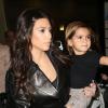 Kim Kardashian et son neveu Mason à l'aéroport de Miami, le 6 novembre 2012.