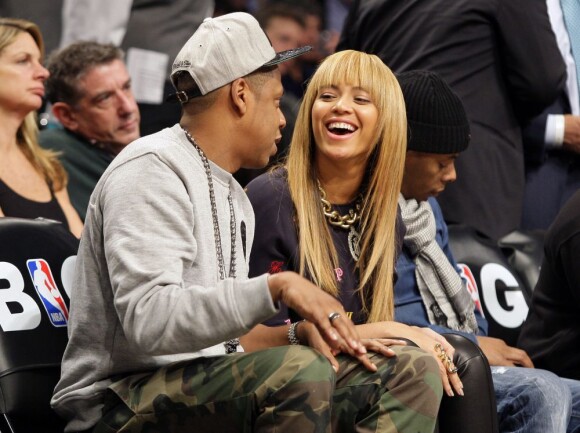 Beyoncé et Jay-Z au Barclays Center de New York le 26 novembre 2012 pour la victoire de leurs protégés des Brooklyn Nets dans le derby contre les Knicks, 96-89.