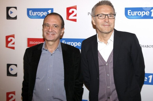 Gérard Miller et Laurent Ruquier lors de la projection au théâtre Antoine du documentaire sur Laurent Ruquier "On ne demande qu'à le connaître" que Gérard Miller a réalisé pour France 2 (diffusion entre Noël et le jour de l'an) à Paris le 2 décembre 2012.