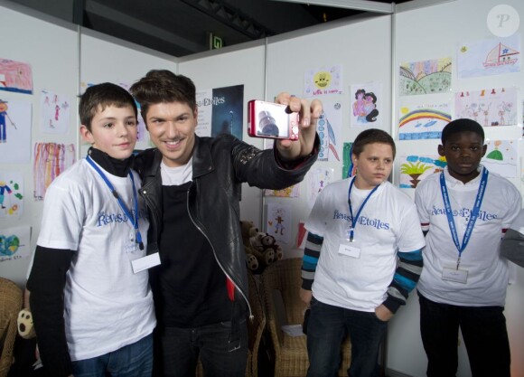 EXCLU - Quentin Mosimann lors du concert des rêves et des étoiles organisé par Make a Wish, à Bruxelles, au Palais du Heysel, 14 decembre 2012.