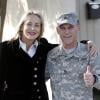 Exclusif - Sharon Stone fait le bonheur d'un G.I. en uniforme en se faisant photographier à ses côtés. Beverly Hills, le 21 décembre 2012.