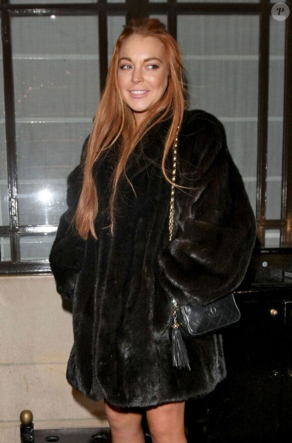 Lindsay Lohan quitte le chic restaurant Cipriani à Londres, le 30 décembre 2012.