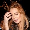 Lindsay Lohan, fatiguée, quitte le restaurant Cipriani à Londres, le 30 décembre 2012.