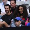 Serena Williams et Patrick Mouratoglou, heureux lors du match de Venus Williams au premier tour de l'Open d'Australie à Melbourne le 14 janvier 2013