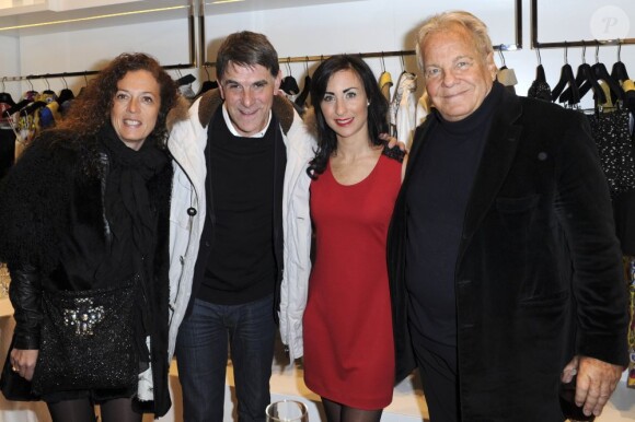 L'animateur Tex et sa femme, en compagnie de Massimo Gargia à la soirée d'ouverture du magasin Lady R Forrest à Paris, le 23 janvier 2013.