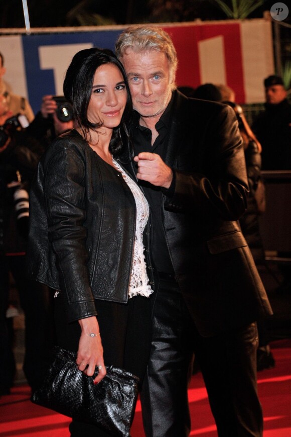 Franck Dubosc et sa femme sur le tapis rouge de la 14e édition des NRJ Music Awards au Palais des Festivals à Cannes, le 26 janvier 2013