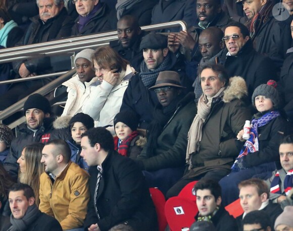 Patrick Bruel, Lilian Thuram, Joey Starr et Jalil Lespert lors de PSG - Bastia au Parc des Princes à Paris, le 8 février 2013.