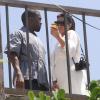 Kim Kardashian enceinte et Kanye West visitent Rio De Janeiro en compagnie de Will Smith, le 10 février 2013. Ils ont visité Vidigal une favela de la ville.