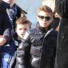 Romeo, Cruz et Harper Beckham se promènent dans Paris le 19 février 2013.