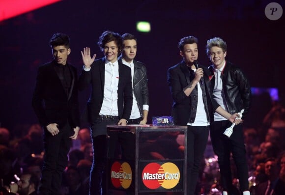 Les One Direction sur la scène des Brit Awards 2013 à Londres, le 20 février 2013.