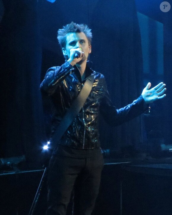 Matthew Bellamy et son groupe Muse sur la scène des Brit Awards 2013 à Londres, le 20 février 2013.