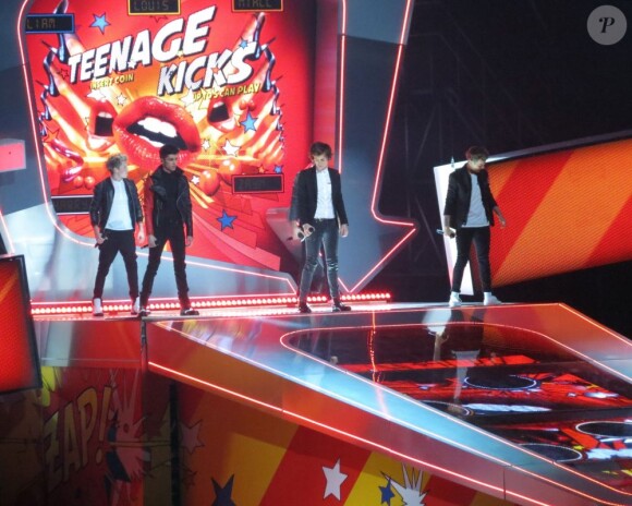 One Direction sur la scène des Brit Awards 2013 à Londres, le 20 février 2013.-
