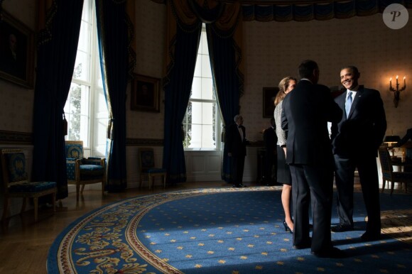 Voici des photos officielles sur les coulisses de l'investiture de Barack Obama et sur la vie à la Maison Blanche. Le président discute avec son porte-parole John Boehner et sa femme Debbie Boehner, le 21 janvier 2013 à Washington.