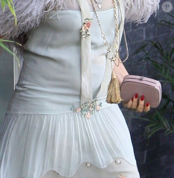 Le baby-bump de Fergie, surprise à la sortie du restaurant Ivy at the Shore à Santa Monica, s'affirme de plus en plus. Le 2 mars 2013.