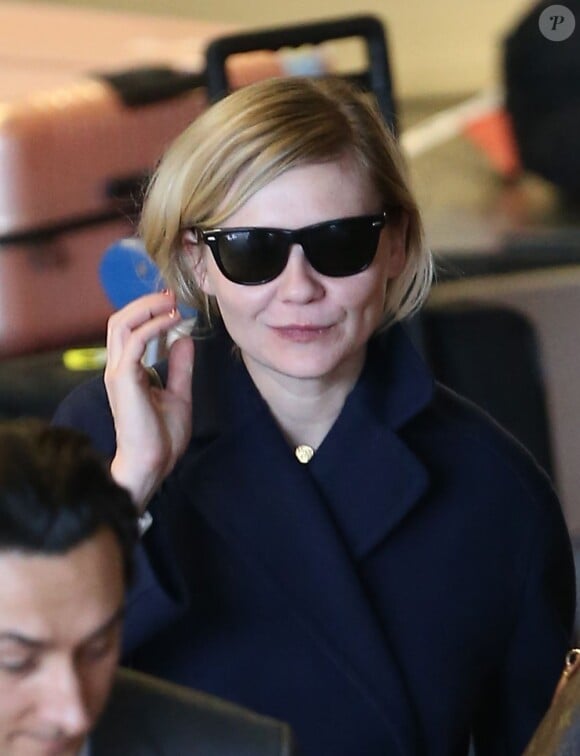Kirsten Dunst arrive à l'aéroport Roissy-Charles-de-Gaulle, le 3 mars 2013.