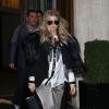 Fergie quitte l'hôtel W pour se rendre au défilé Gareth Pugh automne-hiver 2013. Paris, le 27 février 2013.