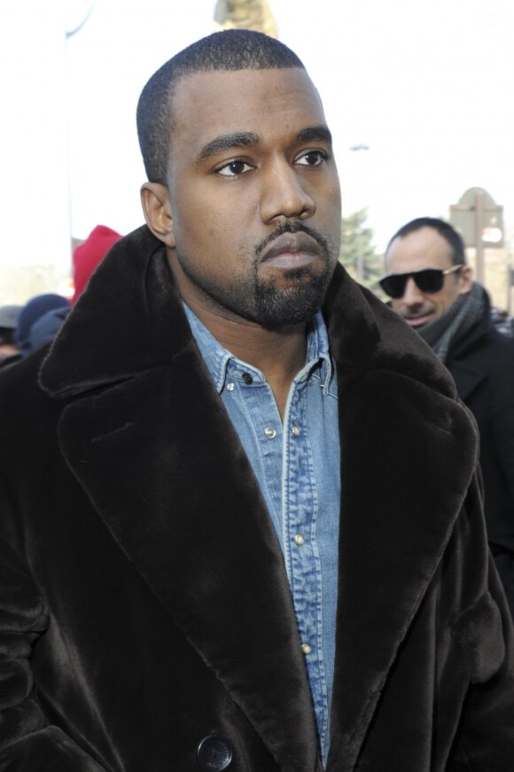 Kanye West arrive au Tennis Club de Paris pour assister au défilé Céline automne-hiver 2013-2014. Paris, le 3 mars 2013.