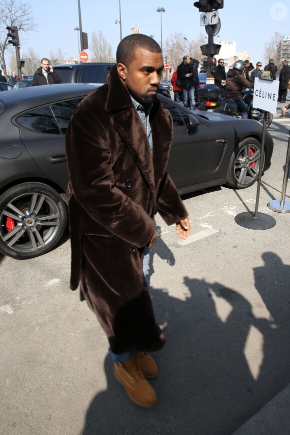 Kanye West arrive au Tennis Club de Paris pour le défilé Céline. Paris, le 3 mars 2013.