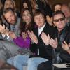 Alasdhair Willis, Sir Paul McCartney, Bono et leurs épouses respectives Nancy Shevell et Ali Hewson assistent au défilé automne-hiver 2013 de Stella McCartney à l'Opéra Garnier. Paris, le 4 mars 2013.