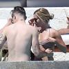 Ashley Tisdale et son chéri Christopher French dans la piscine à Cabo San Lucas au Mexique, le 4 mars 2013.