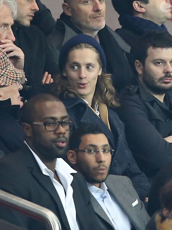 Pierre Sarkozy et Teddy Riner lors du match de Ligue des champions entre le PSG et Valence (1-1) au Parc des Princes à Paris le 6 mars 2013