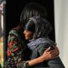Michelle Obama et Dr. Josephine Odumakin qui reçoit un prix Femme de courage à Washington le 8 mars 2013.