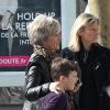 Brooklyn et Cruz Beckham se promènent avec leur grand-mere Sandra Georgina sur les Champs-Elysees à Paris, le 9 mars 2013