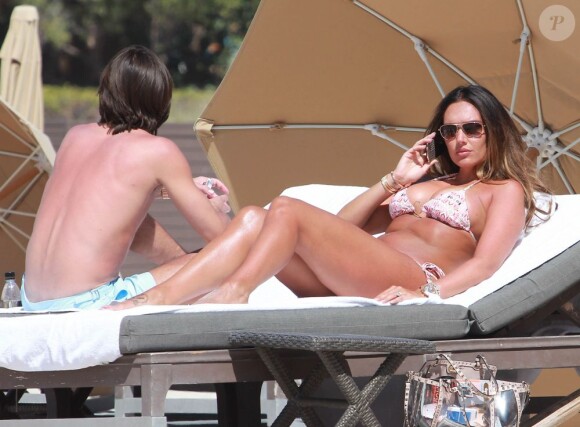 Tamara Ecclestone et son fiancé Jay Rutland profitent du soleil de Miami ce jeudi 14 mars 2013 en ne faisant rien.