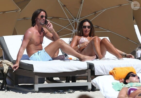 Tamara Ecclestone et son fiancé Jay Rutland profitent du soleil de Miami ce jeudi 14 mars 2013 en ne faisant rien.