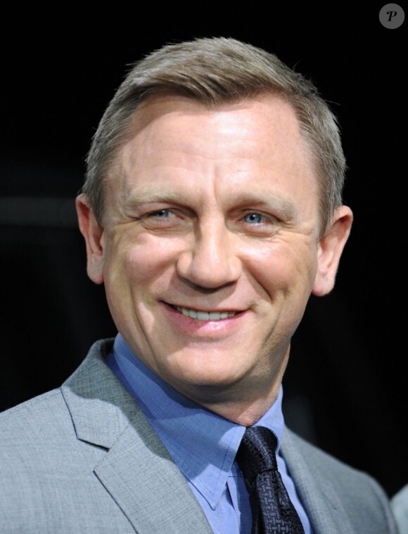 Daniel Craig tout sourire au Salon de l'automobile de New York, le 26 mars 2013.