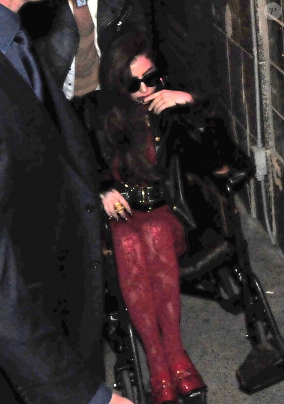 La chanteuse Lady GaGa et son compagnon Taylor Kinney profitant d'une soirée festive à Chicago, ce vendredi 29 mars 2013.