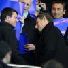Manuel Valls et Nicolas Sarkozy - Quart de finale aller de la Ligue des champions de football entre le Paris Saint-Germain et le FC Barcelone au Parc des Princes à Paris le 2 avril 2013.