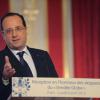 François Hollande décorait François Gabart, vainqueur du Vendée Globe 2012-2013 de la Légion d'honneur le 8 avril 2013 au palais de l'Elysée en compagnie des anciens vainqueurs du Vendée Globe