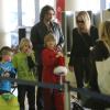 Sharon Stone, son petit ami Martin Mica et ses fils Roan, Laird et Quinn à l'aéroport de Los Angeles, le 23 décembre 2012.