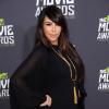 Kim Kardashian en robe Saint Laurent et souliers Christian Dior assiste aux MTV Movie Awards. Los Angeles, le 14 avril 2013.