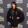 Kim Kardashian en robe Saint Laurent et souliers Christian Dior assiste aux MTV Movie Awards. Los Angeles, le 14 avril 2013.