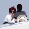 Sharon Osbourne, plutôt triste et boudeuse, en vacances avec sa fille Aimee et son boyfriend, au Mexique, le 17 avril 2013.