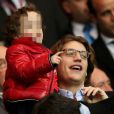 Jean Sarkozy avec son fils Solal et sa femme Jessica lors du match PSG-Nice au Parc des Princes à Paris le 21 avril 2013.